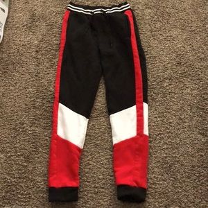 Red, white, and black winter/fall pants